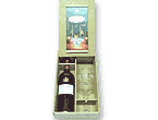 Estuche de madera con botella de vino Salentein y copa.