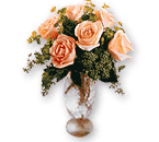Media docena de rosas preparadas en florero