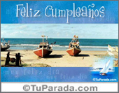 Feliz cumpleaños con barcos en la playa